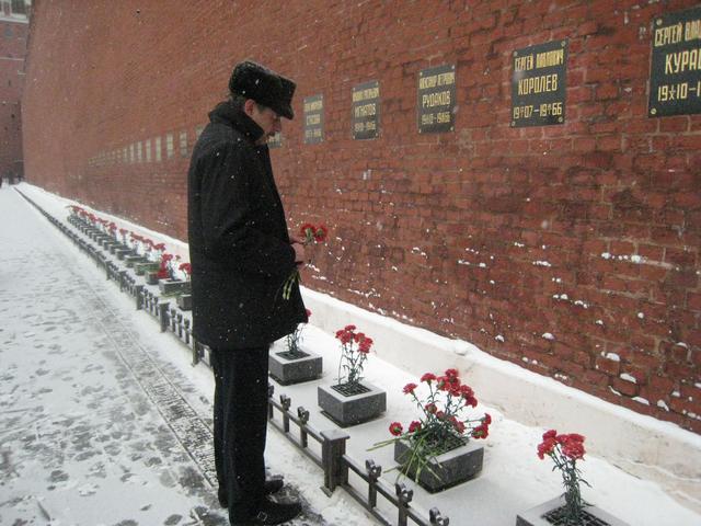 JSC2010-E-041315 (19 March 2010) ----At the Kremlin Wall in Red Square in Moscow March 19, 2010, Russian cosmonaut Mikhail Kornienko, Expedition 23 flight engineer, lays flowers in a traditional ceremony prior to his departure for the launch site at the Baikonur Cosmodrome in Kazakhstan for final preparations for launch on the Soyuz TMA-18 spacecraft to the International Space Station April 2. Russian cosmonaut Alexander Skvortsov, Soyuz commander, NASA astronaut Tracy Caldwell Dyson, Expedition 23 flight engineer, and Kornienko were certified for launch earlier in the day by the Russian State Commission.  Credit: NASA/Stephanie Stoll