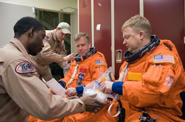 NASA image: STS-133 crew during CCTII Post Insertion/Deorbit Prep training