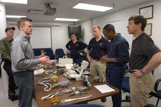 NASA image: STS-133 crew during ISS Small Tools training with instructor Jake Delap.