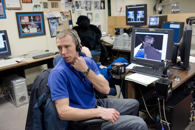 NASA image: STS-134 crew and Expedition 24/25 crew member Shannon Walker 
