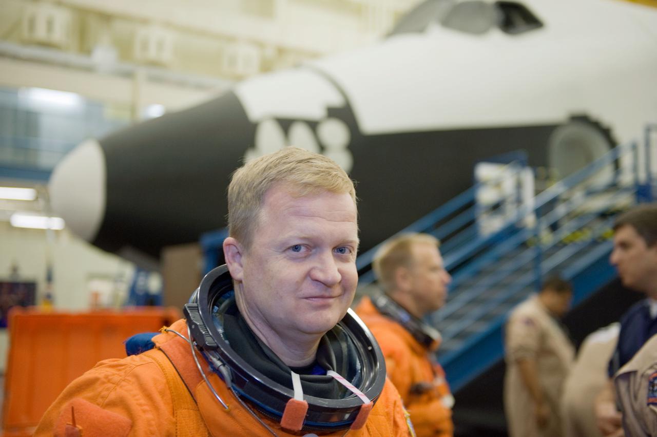 JSC2010-E-043934 (26 March 2010) --- NASA astronaut Eric Boe, STS-133 pilot, attired in a training version of his shuttle launch and entry suit, is pictured during a training session in the Space Vehicle Mock-up Facility at NASA's Johnson Space Center.