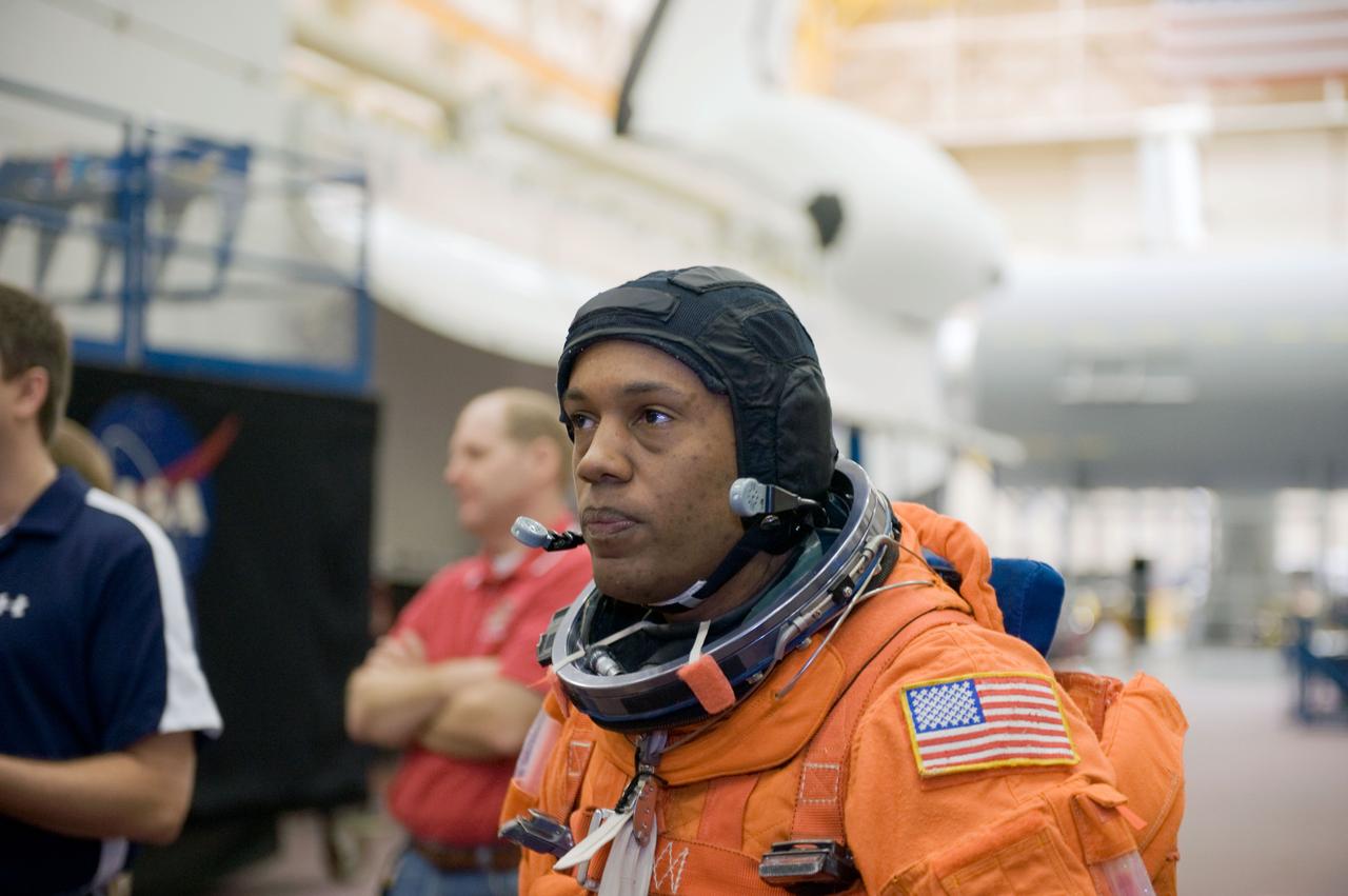 JSC2010-E-043936 (26 March 2010) --- NASA astronaut Alvin Drew, STS-133 mission specialist, attired in a training version of his shuttle launch and entry suit, is pictured during a training session in the Space Vehicle Mock-up Facility at NASA's Johnson Space Center.