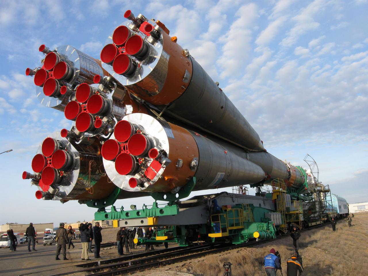 The Soyuz TMA-18 spacecraft and its booster rocket are hauled to the launch pad through the barren Baikonur Cosmodrome in Kazakhstan March 31, 2010 for launch April 2 to transport Expedition 23 crewmates Alexander Skvortsov, Mikhail Kornienko and Tracy Caldwell Dyson to the International Space Station.