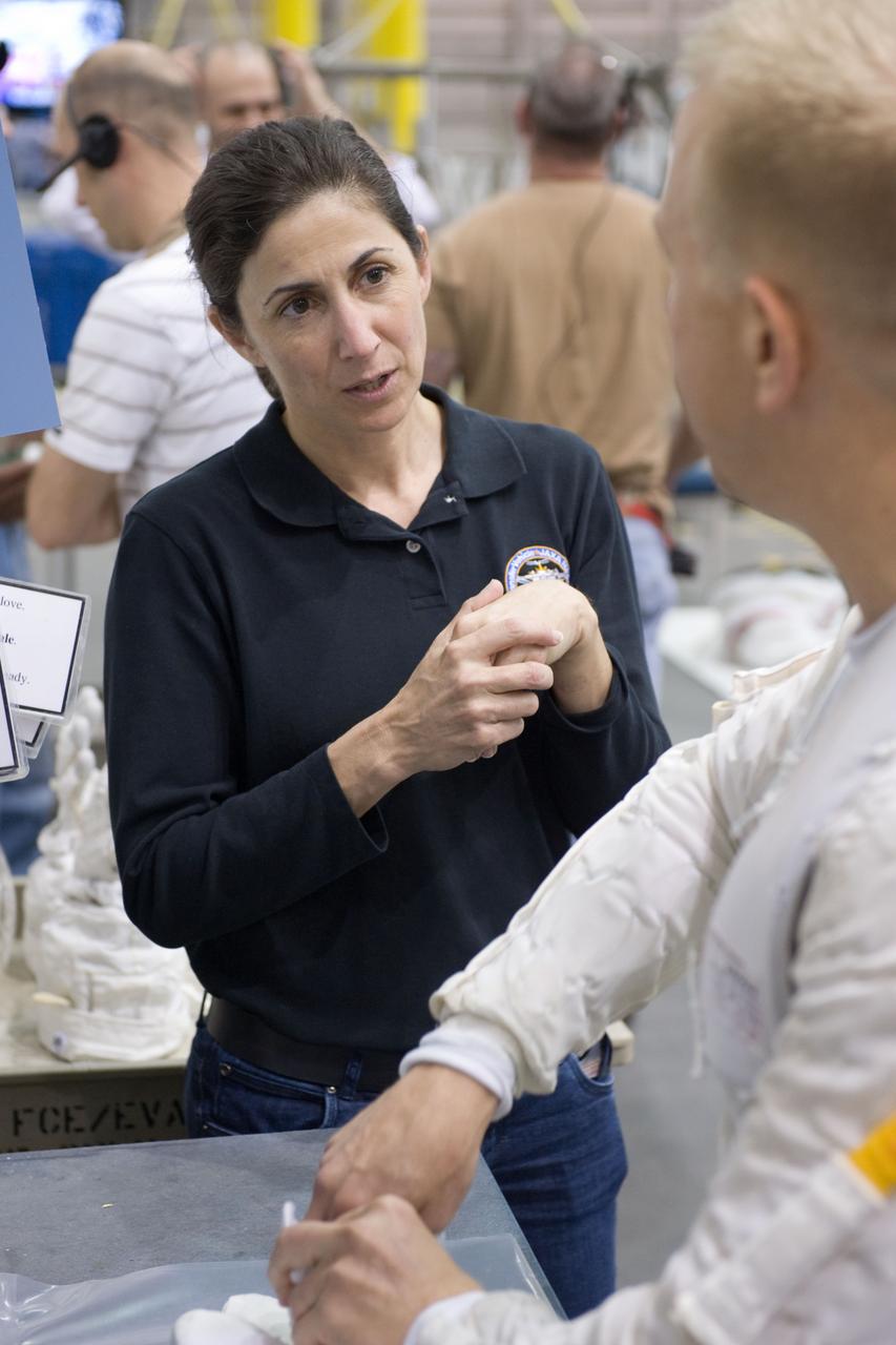 JSC2010-E-046444 (31 March 2010) --- NASA astronauts Nicole Stott and Tim Kopra, both STS-133 mission specialists, are pictured during a training session in the Neutral Buoyancy Laboratory (NBL) near NASA's Johnson Space Center.
