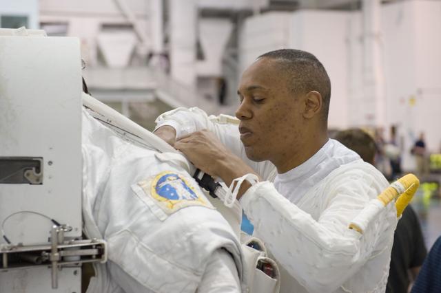 NASA image: STS-133 crew members Tim Kopra and Benjamin Drew