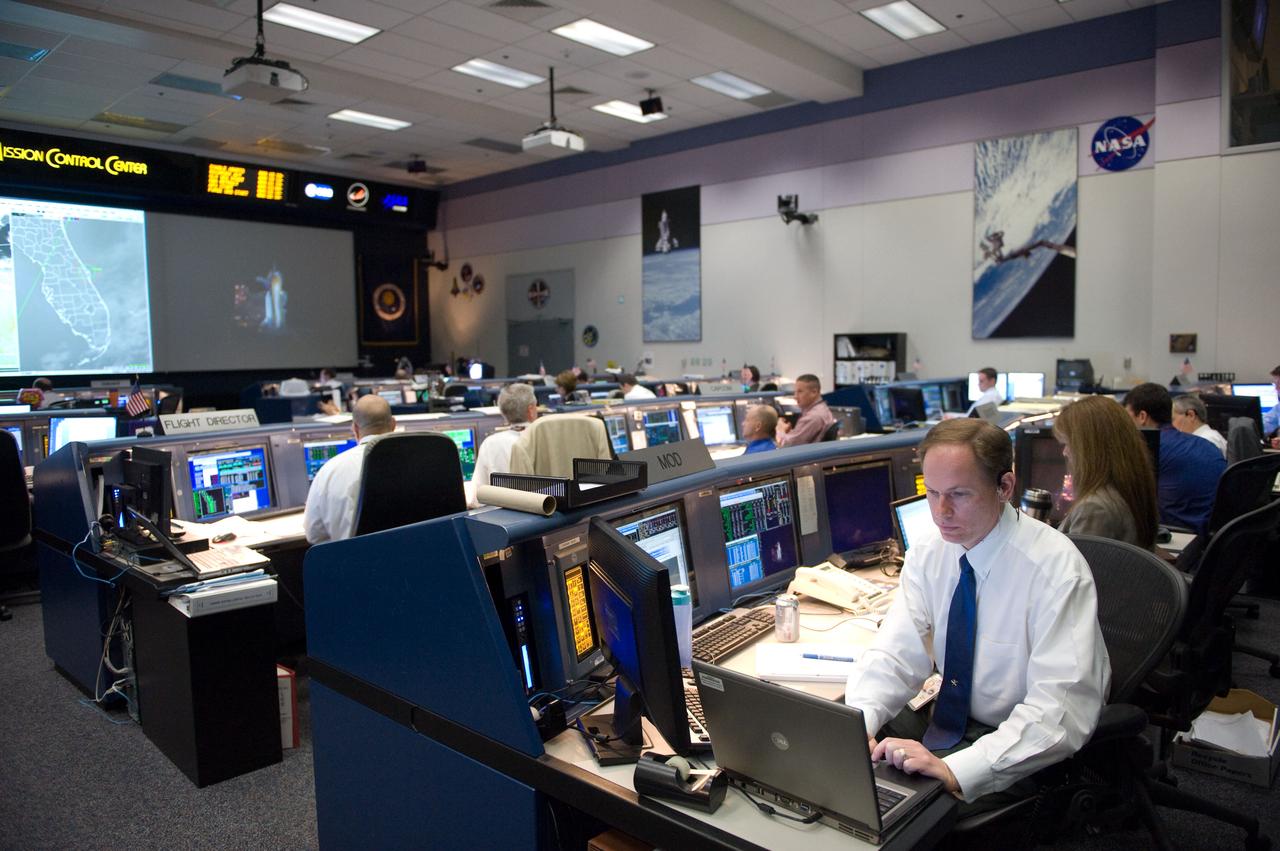 JSC2010-E-046782 (5 April 2010) --- An overall view of the space shuttle flight control room in the Johnson Space Center's Mission Control Center during launch countdown activities a few hundred miles away in Florida, site of space shuttle Discovery's STS-131 launch. John McCullough, chief of the Flight Director Office, is visible at right foreground.
