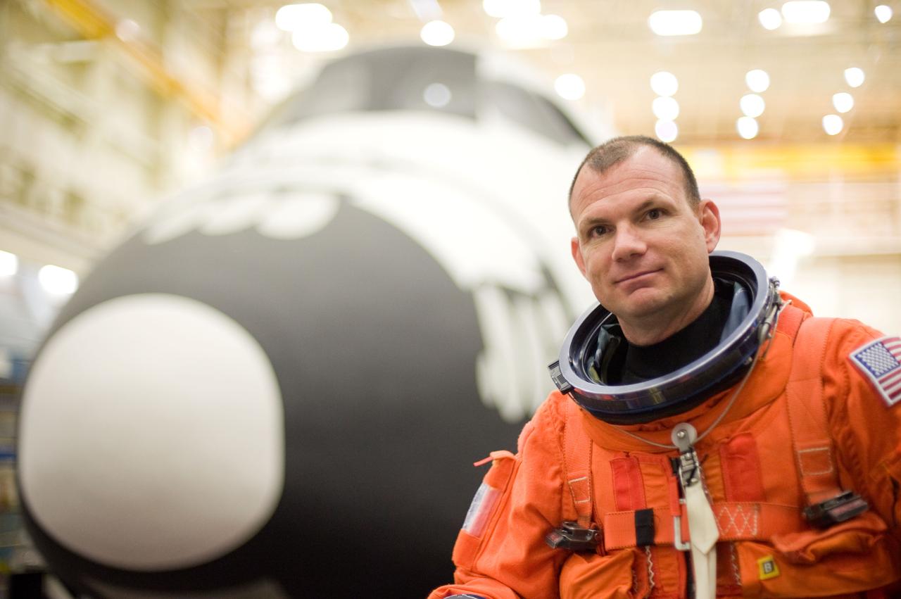 JSC2010-E-052000 (8 April 2010) --- NASA astronaut Tony Antonelli, STS-132 pilot, attired in a training version of his shuttle launch and entry suit, is pictured during an ingress/egress training session in the Space Vehicle Mock-up Facility at NASA's Johnson Space Center.