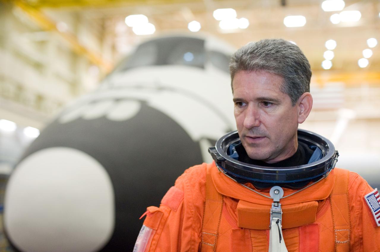 JSC2010-E-052005 (8 April 2010) --- NASA astronaut Michael Good, STS-132 mission specialist, attired in a training version of his shuttle launch and entry suit, is pictured during an ingress/egress training session in the Space Vehicle Mock-up Facility at NASA's Johnson Space Center.