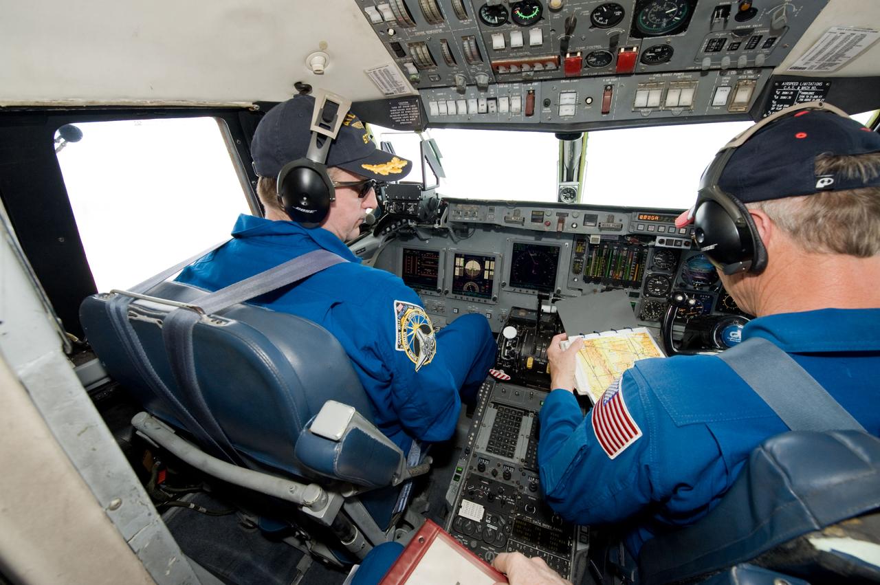 JSC2010-E-054299 (30 March 2010) --- NASA astronaut Ken Ham (left), STS-132 commander, flies a Shuttle Training Aircraft (STA) over White Sands Space Harbor, New Mexico, during a training session.