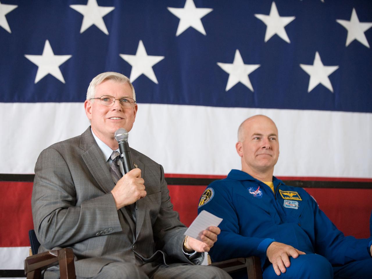 JSC2010-E-055368 (21 April 2010) --- NASA's Johnson Space Center (JSC) director Michael L. Coats (left) addresses a large crowd of well-wishers at the STS-131 crew return ceremony on April 21, 2010 at Ellington Field near JSC. NASA astronaut Alan Poindexter, STS-131 commander, is at right.