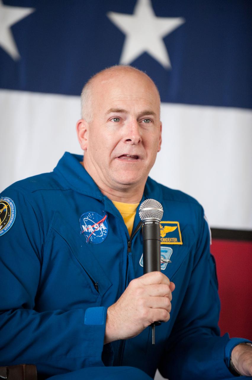 JSC2010-E-055371 (21 April 2010) --- NASA astronaut Alan Poindexter, STS-131 commander, addresses a large crowd of well-wishers at the STS-131 crew return ceremony on April 21, 2010 at Ellington Field near NASA?s Johnson Space Center.
