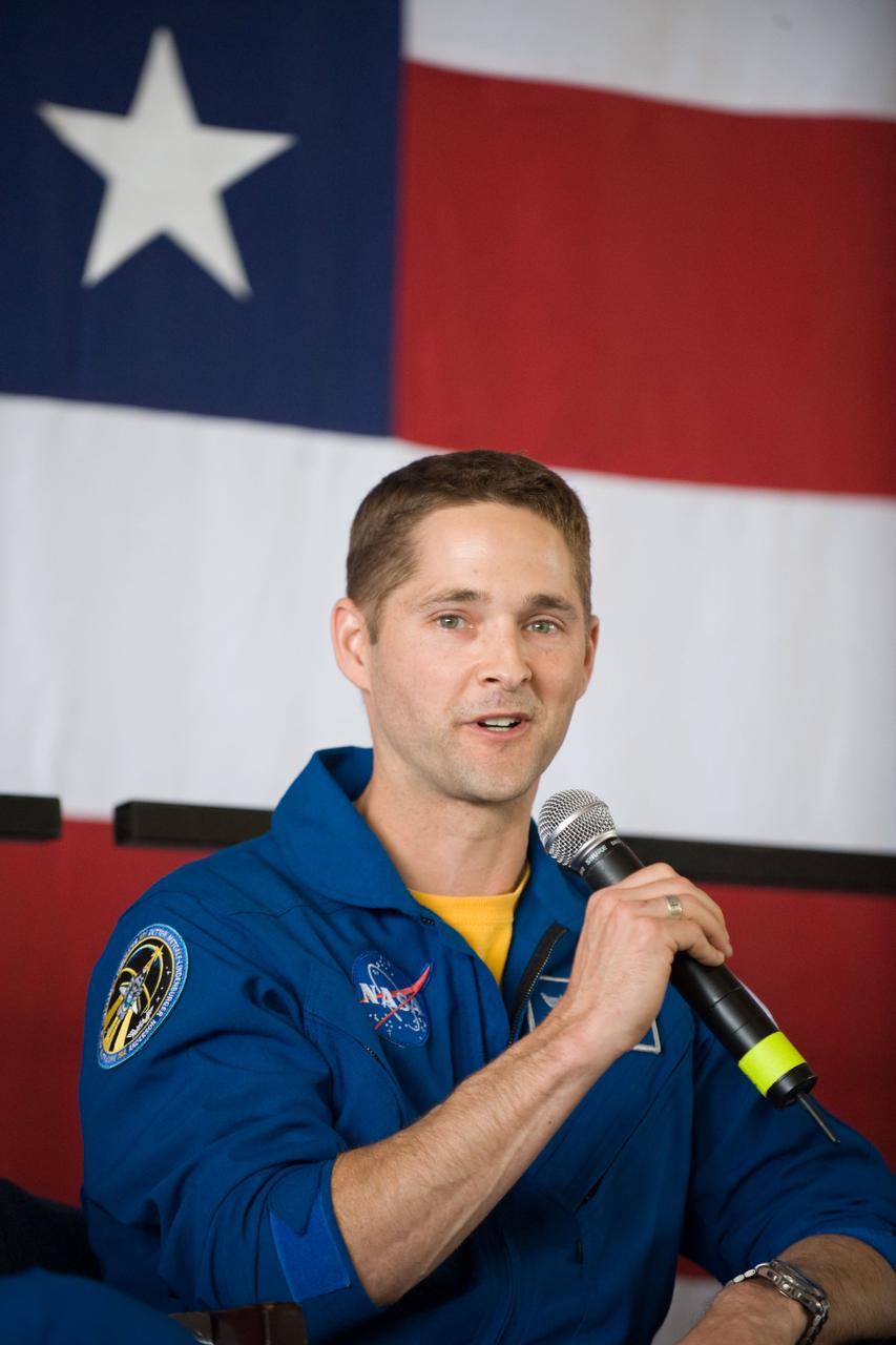 JSC2010-E-055379 (21 April 2010) --- NASA astronaut James P. Dutton Jr., STS-131 pilot, addresses a large crowd of well-wishers at the STS-131 crew return ceremony on April 21, 2010 at Ellington Field near NASA?s Johnson Space Center.