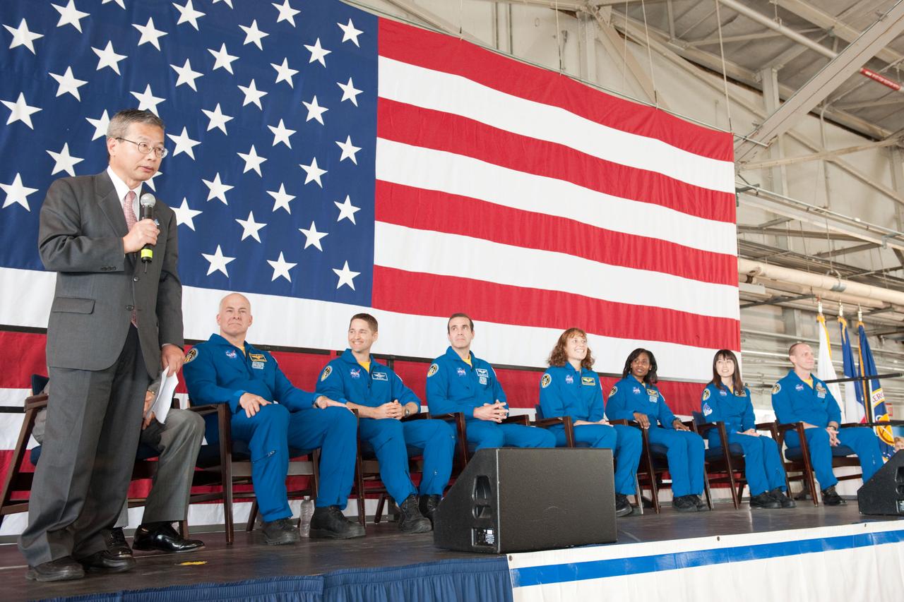 JSC2010-E-055398 (21 April 2010) --- Dr. Kuniaki Shiraki, executive director, Japan Aerospace Exploration Agency (JAXA), addresses a large crowd of well-wishers at the STS-131 crew return ceremony on April 21, 2010 at Ellington Field near NASA?s Johnson Space Center. Also pictured (seated from the left) are JSC director Michael L. Coats (mostly obscured), NASA astronauts Alan Poindexter, commander; James P. Dutton Jr., pilot; Rick Mastracchio, Dorothy Metcalf-Lindenburger, Stephanie Wilson, Japan Aerospace Exploration Agency (JAXA) astronaut Naoko Yamazaki and NASA astronaut Clayton Anderson, all mission specialists.