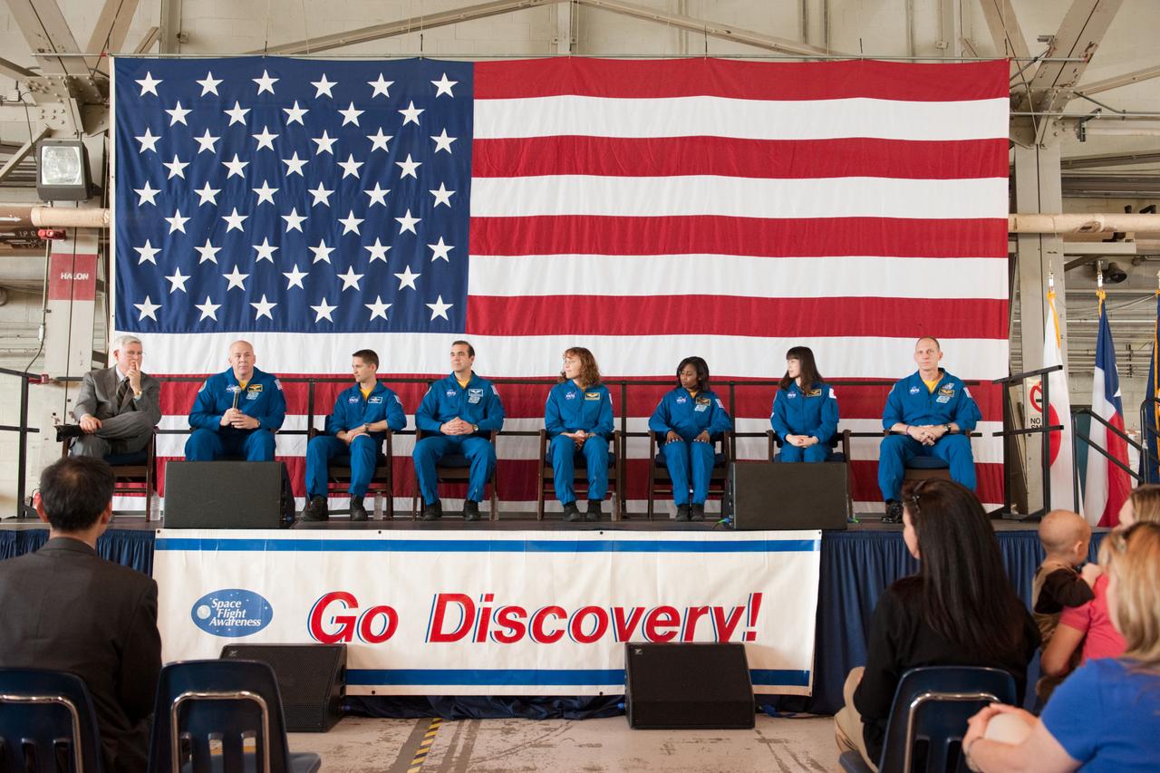 JSC2010-E-055399 (21 April 2010) --- NASA's Johnson Space Center (JSC) director Michael L. Coats (left) and the STS-131 crew members are pictured at the STS-131 crew return ceremony on April 21, 2010 at Ellington Field near JSC. Pictured from the second left are NASA astronauts Alan Poindexter, commander; James P. Dutton Jr., pilot; Rick Mastracchio, Dorothy Metcalf-Lindenburger, Stephanie Wilson, Japan Aerospace Exploration Agency (JAXA) astronaut Naoko Yamazaki and NASA astronaut Clayton Anderson, all mission specialists.