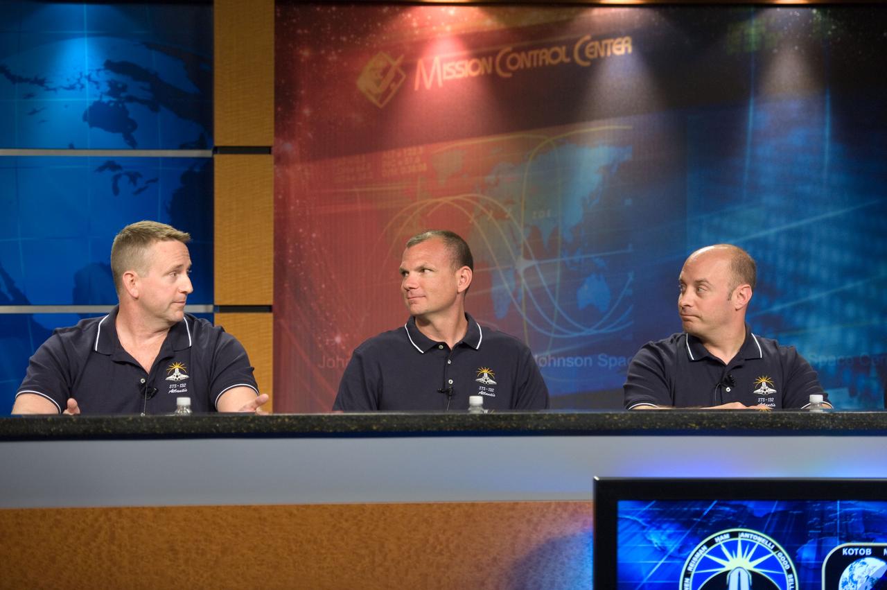 JSC2010-E-063786 (3 May 2010) --- NASA astronauts Ken Ham (left), STS-132 commander; Tony Antonelli, pilot; and Garrett Reisman, mission specialist, are pictured during an STS-132 preflight press conference at NASA's Johnson Space Center.