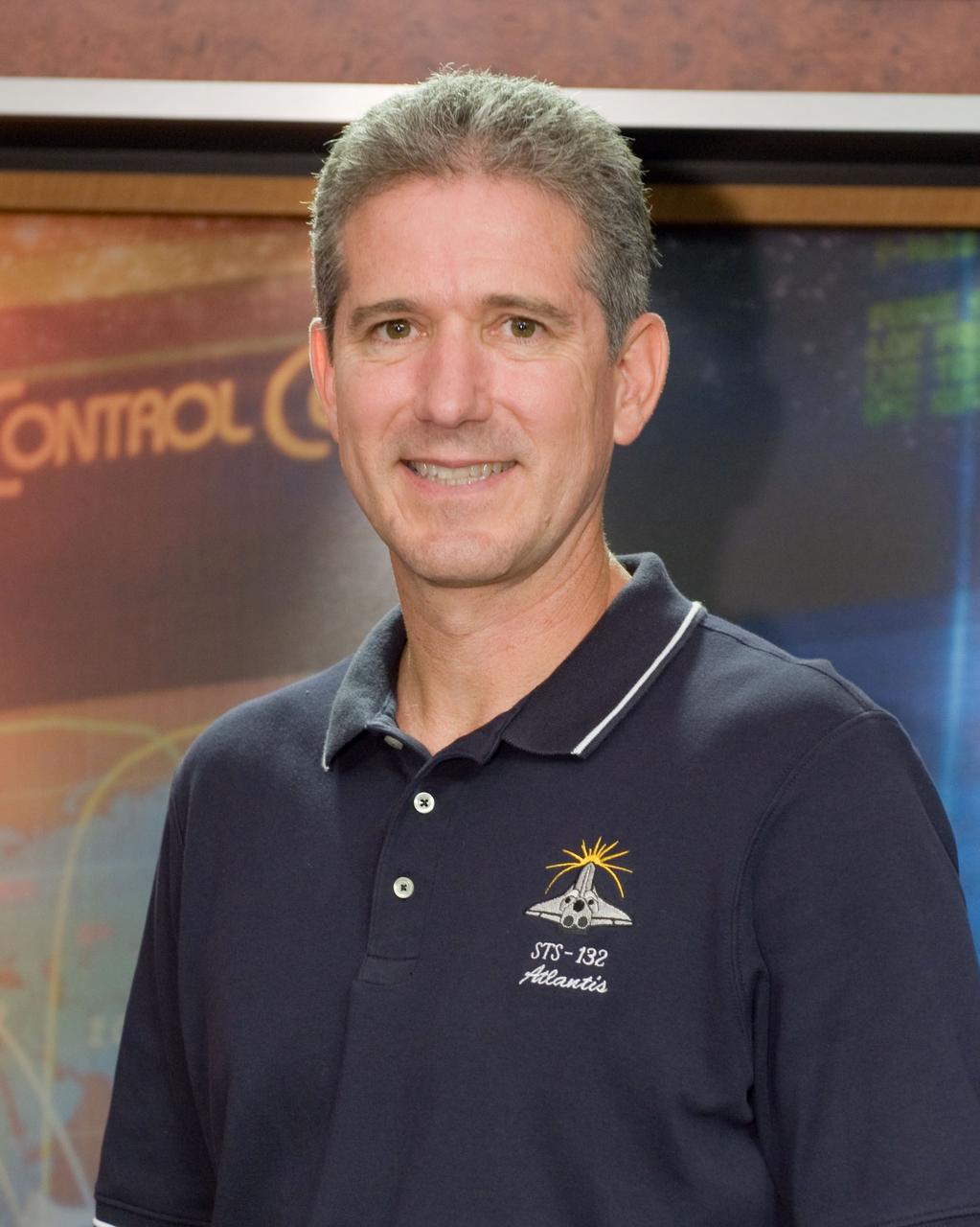 JSC2010-E-063823 (3 May 2010) --- NASA astronaut Mike Good, STS-132 mission specialist, poses for a portrait following an STS-132 preflight press conference at NASA's Johnson Space Center.