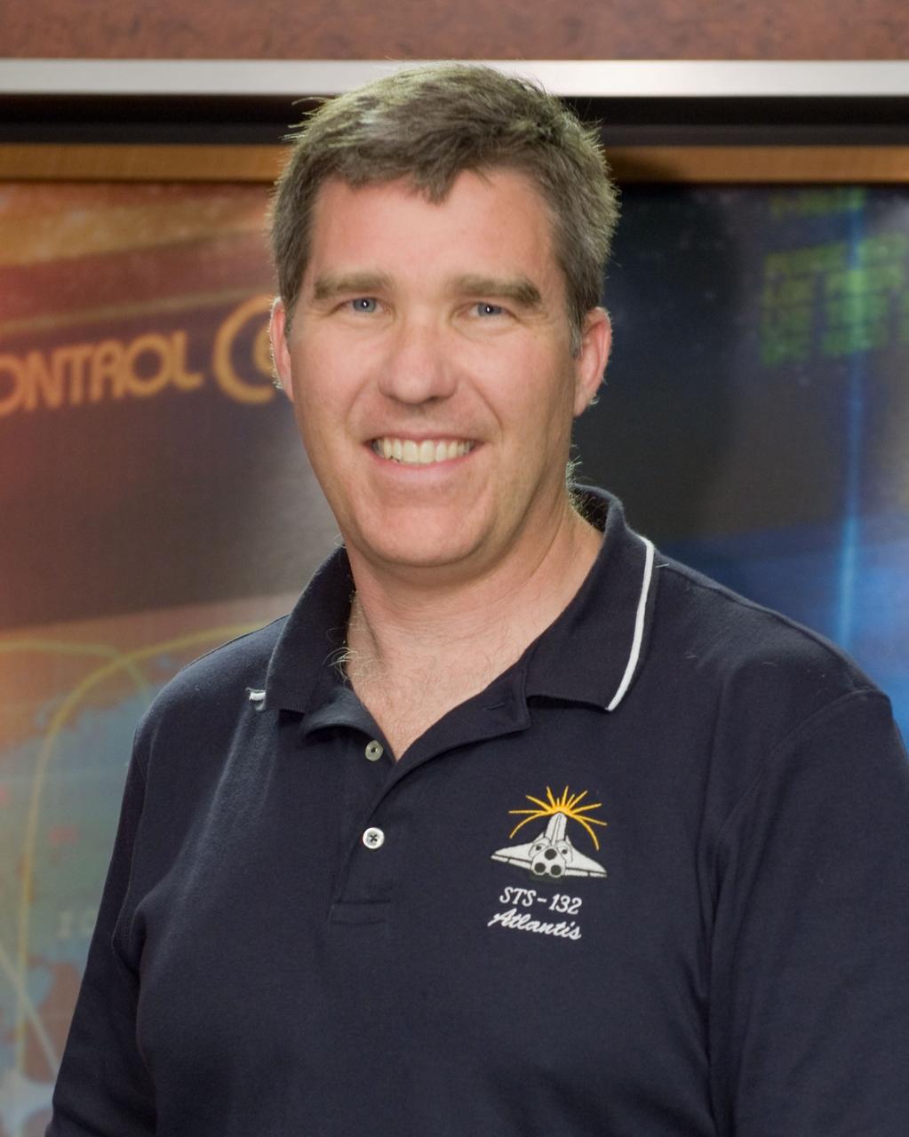 JSC2010-E-063825 (3 May 2010) --- NASA astronaut Steve Bowen, STS-132 mission specialist, poses for a portrait following an STS-132 preflight press conference at NASA's Johnson Space Center.