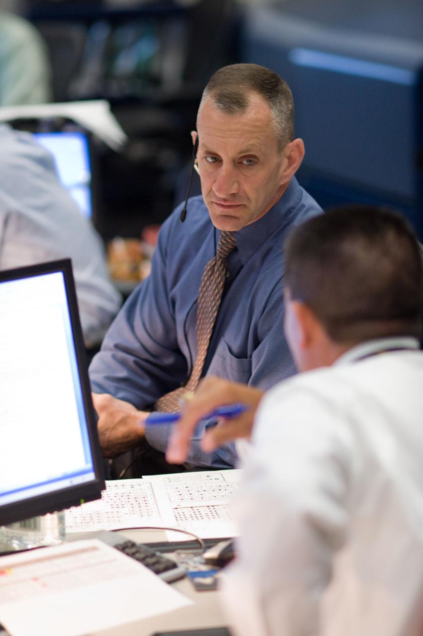 JSC2010-E-080411 (14 May 2010) --- Astronaut Charles Hobaugh, spacecraft communicator (CAPCOM) for the STS-132 mission, is pictured in the space shuttle flight control room in the Johnson Space Center's Mission Control Center during launch countdown activities a few hundred miles away in Florida, site of space shuttle Atlantis? STS-132 launch. Liftoff was on time at 2:20 p.m. (EDT) on May 14, 2010 from launch pad 39A at NASA's Kennedy Space Center.