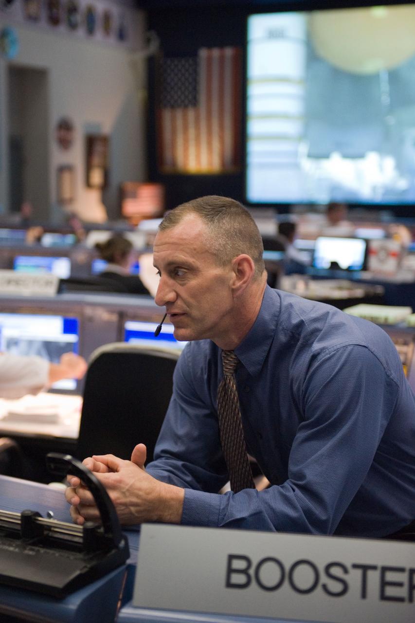 JSC2010-E-080432 (14 May 2010) --- Astronaut Charles Hobaugh, spacecraft communicator (CAPCOM) for the STS-132 mission, is pictured in the space shuttle flight control room in the Johnson Space Center's Mission Control Center during launch countdown activities a few hundred miles away in Florida, site of space shuttle Atlantis? STS-132 launch. Liftoff was on time at 2:20 p.m. (EDT) on May 14, 2010 from launch pad 39A at NASA's Kennedy Space Center.
