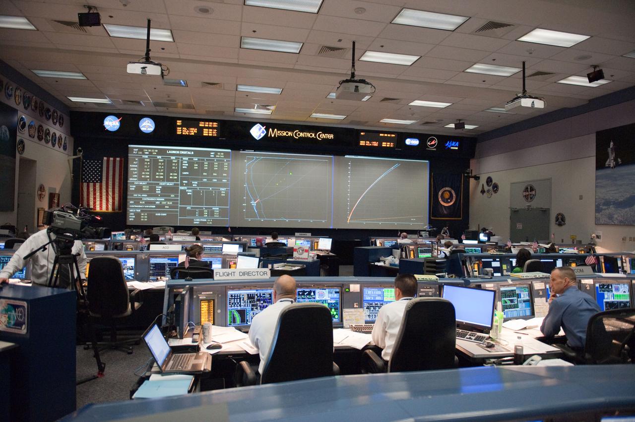 JSC2010-E-080461 (14 May 2010) --- An overall view of the space shuttle flight control room in the Johnson Space Center's Mission Control Center during launch countdown activities a few hundred miles away in Florida, site of space shuttle Atlantis? STS-132 launch. Visible in the foreground (from center left) are flight directors Tony Ceccacci and Richard Jones; along with astronaut Charles Hobaugh, spacecraft communicator (CAPCOM). Liftoff was on time at 2:20 p.m. (EDT) on May 14, 2010 from launch pad 39A at NASA's Kennedy Space Center.
