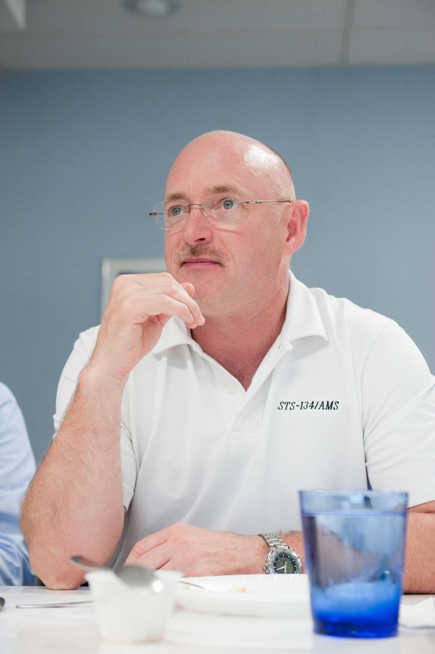 JSC2010-E-087713 (25 May 2010) --- NASA astronaut Mark Kelly, STS-134 commander, participates in a food tasting session in the Habitability and Environmental Factors Office at NASA's Johnson Space Center. Photo credit: NASA or National Aeronautics and Space Administration
