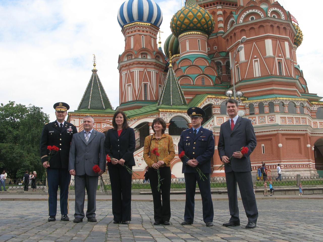The prime and backup crews for the launch of the Soyuz TMA-19 spacecraft to the International Space Station conduct their ceremonial tour of Red Square May 31, 2010 prior to flying to the Baikonur Cosmodrome in Kazakhstan for final prelaunch preparations. From left to right are prime crewmembers Doug Wheelock, Soyuz Commander Fyodor Yurchikhin and Flight Engineer Shannon Walker and backup crewmembers Cady Coleman, Dmitri Kondratiev and Paolo Nespoli of the European Space Agency. Wheelock, Walker and Yurchikhin are scheduled to liftoff June 16 to the International Space Station.  Credit: NASA/Stephanie Stoll and Mark Polansky 
