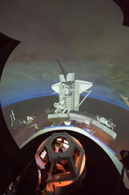 NASA image: STS-133 crew members Mike Barratt and Nicole Stott in cupola