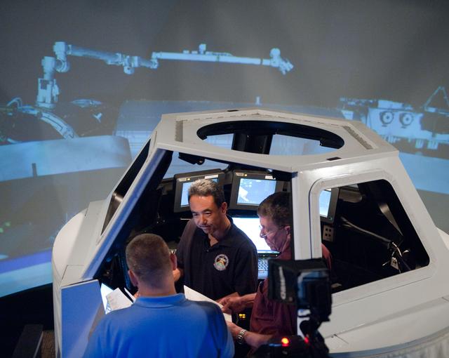 NASA image: Satoshi Furukawa during FF RNDZ ADV1 training in the ISS cupola trainer in the SES dome.  