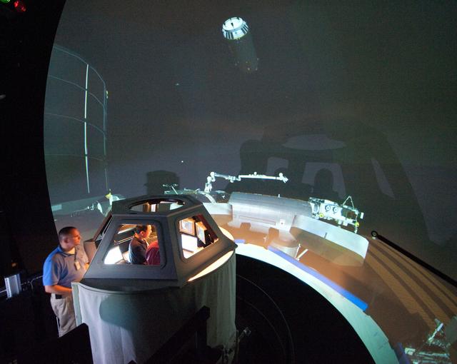 NASA image: Satoshi Furukawa during FF RNDZ ADV1 training in the ISS cupola trainer in the SES dome.  