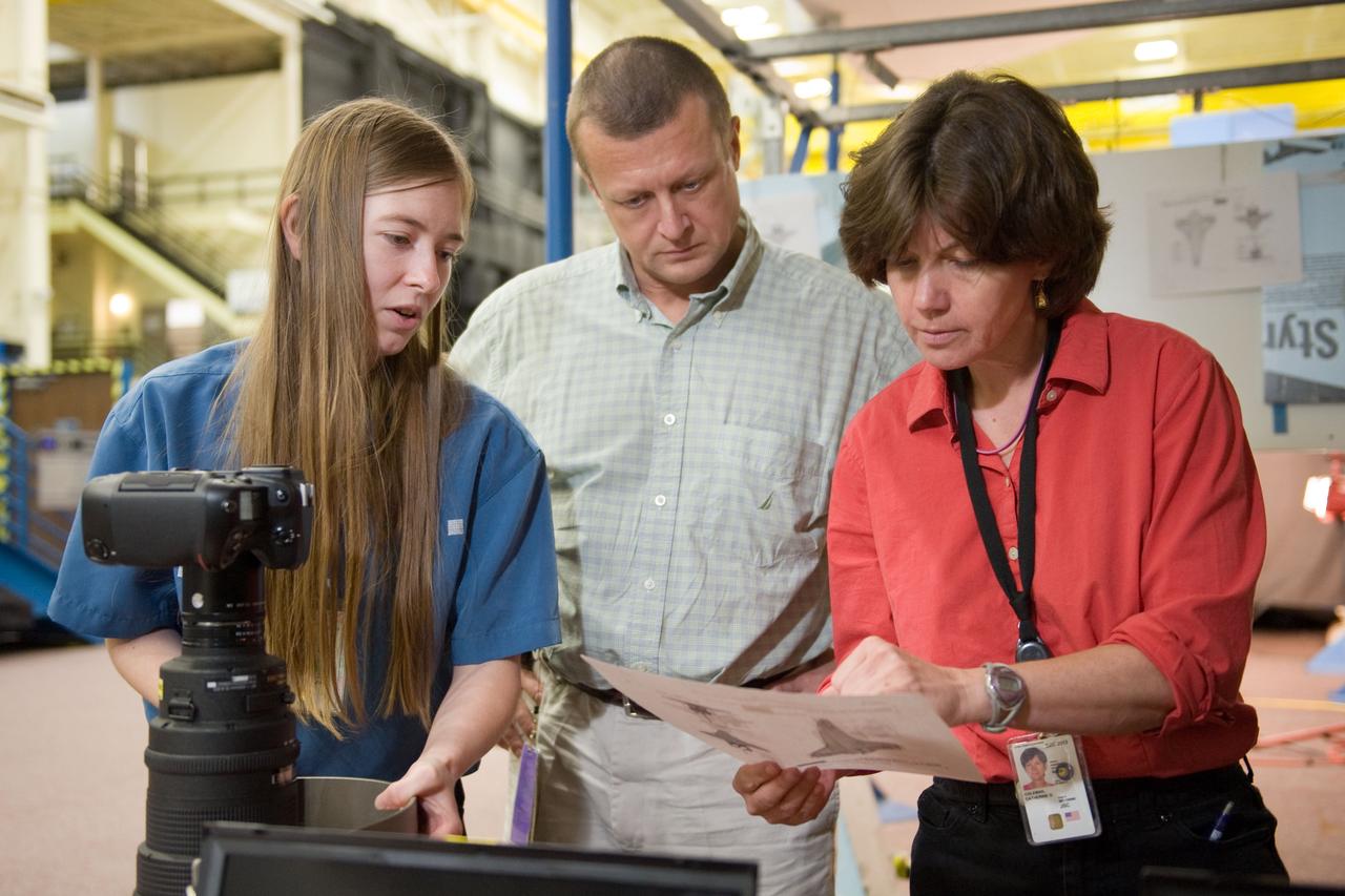PHOTO DATE: 07-13-10 LOCATION: Bldg 9NW, ISS Mockups SUBJECT: Expedition 26 crew members Cady Coleman and Dmitri Kondratyev during their docking timeline training. PHOTOGRAPHER: James Blair