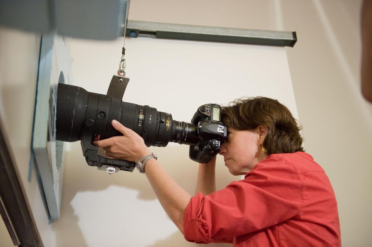 PHOTO DATE: 07-13-10 LOCATION: Bldg 9NW, ISS Mockups SUBJECT: Expedition 26 crew members Cady Coleman and Dmitri Kondratyev during their docking timeline training. PHOTOGRAPHER: James Blair