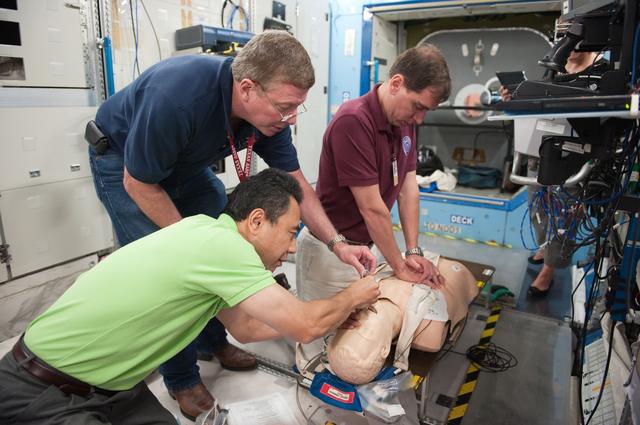 NASA image: Expedition 28 crew members Mike Fossum, Satoshi Furukawa, Sergei Volkov 