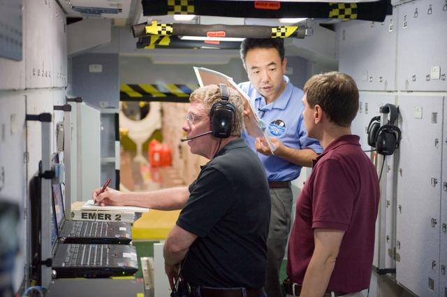 NASA image: ISS 28 crew member Mike Fossum, Satoshi Furukawa, Sergei Volkov  