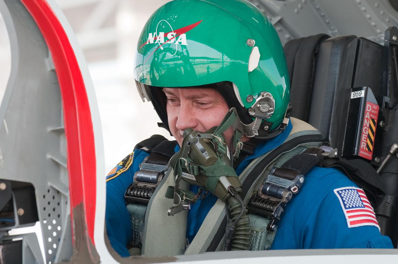 JSC2010-E-119551 (25 Aug. 2010) --- NASA astronaut Michael Fincke, STS-134 mission specialist, prepares for a flight in a NASA T-38 trainer jet at Ellington Field near NASA's Johnson Space Center. Photo credit: NASA or National Aeronautics and Space Administration