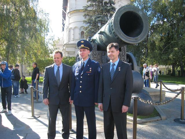 JSC2010-E-132987 (17 Sept. 2010)  ---  Backup Expedition 25 crew members Ron Garan of NASA (left) and cosmonauts Sergei Volkov (center) and Oleg Kononenko (right) pose for pictures in front of the Tsar Cannon at the Kremlin in Moscow Sept. 17, 2010 as they joined prime crew members Scott Kelly, Alexander Kaleri and Oleg Skripochka (all out of frame)  in ceremonial activities leading up to the launch of Kelly, Kaleri and Skripochka to the International Space Station Oct. 8 (Kazakhstan time) in the Soyuz TMA-01M spacecraft from the Baikonur Cosmodrome in Kazakhstan for  a 5 ? month stay on the International Space Station. Photo credit: Stephanie Stoll/NASA
