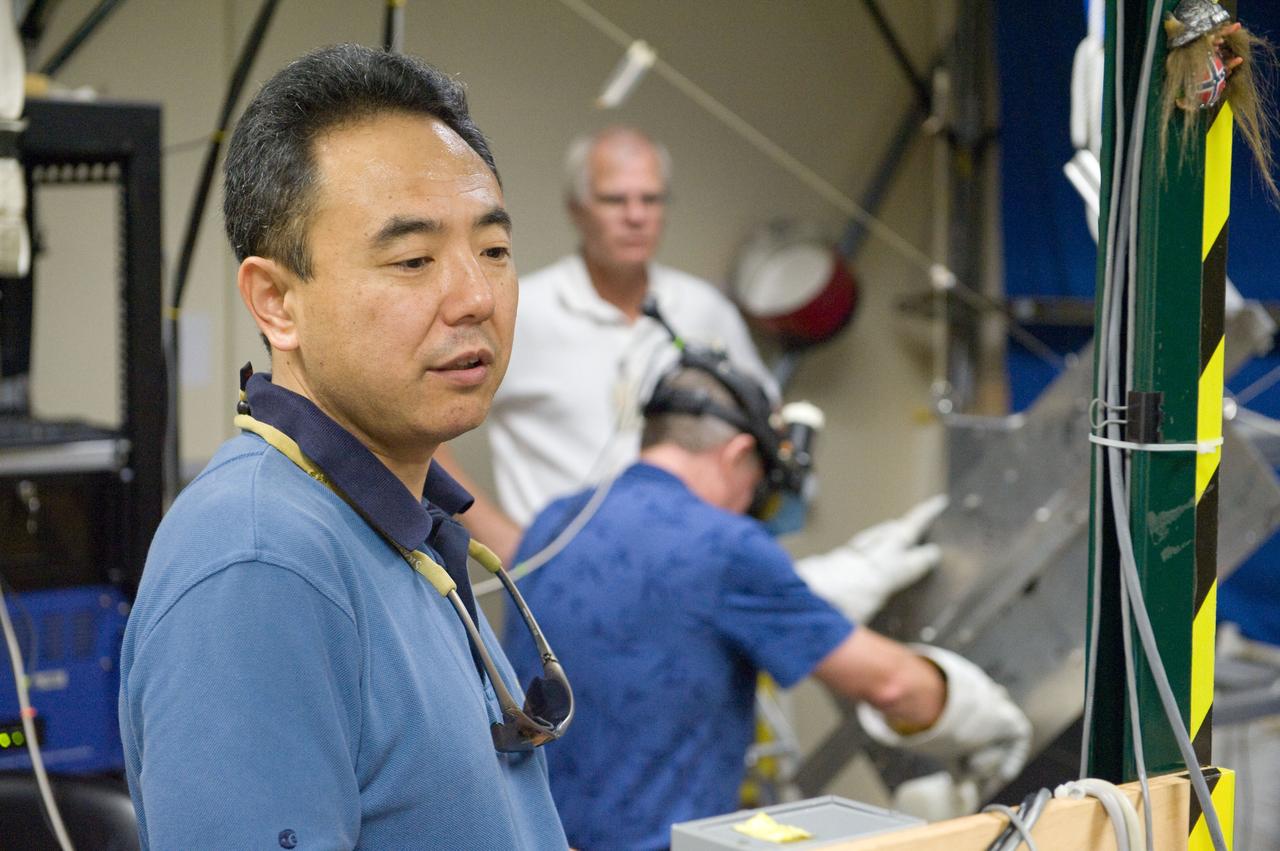 PHOTO DATE: 23 September 2010, LOCATION: Bldg. 9 Virtual Reality Lab, SUBJECT: Expedition 28 crew members Mike Fossum and Satoshi Furukawa during ROBO/EVA #1 Training. PHOTOGRAPHER: Mark Sowa