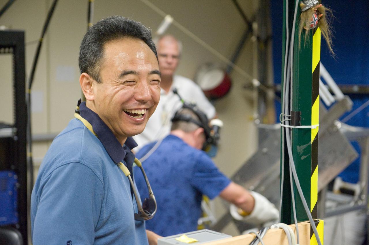 PHOTO DATE: 23 September 2010, LOCATION: Bldg. 9 Virtual Reality Lab, SUBJECT: Expedition 28 crew members Mike Fossum and Satoshi Furukawa during ROBO/EVA #1 Training. PHOTOGRAPHER: Mark Sowa