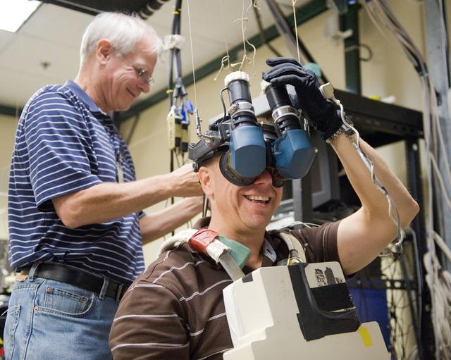 NASA image: STS-133 crew during MSS/EVAA TEAM training in Virtual Reality Lab  