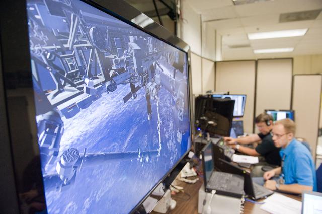 NASA image: STS-133 crew during MSS/EVAA TEAM training in Virtual Reality Lab  
