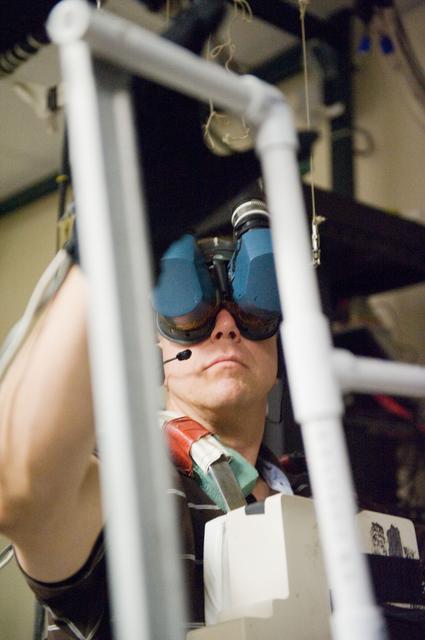 NASA image: STS-133 crew during MSS/EVAA TEAM training in Virtual Reality Lab  