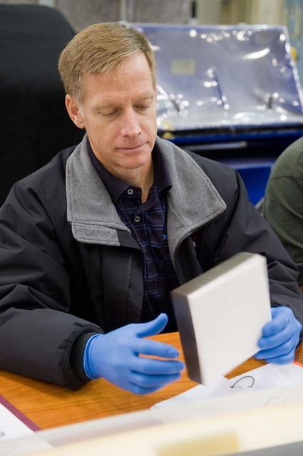 NASA image: STS-335 crew training, EVA TPS Overview with instructor John Ray    