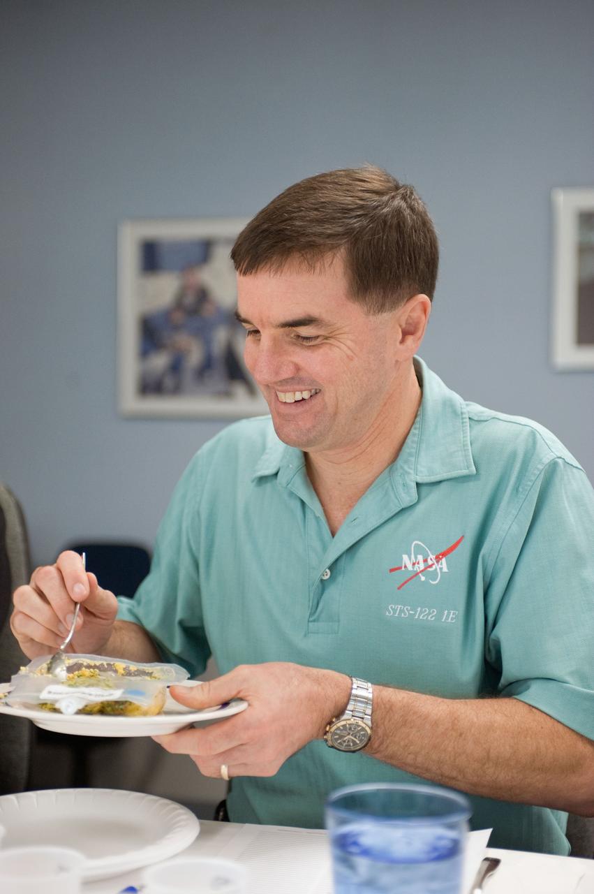 JSC2010-E-185479 (10 Nov. 2010) --- NASA astronaut Rex Walheim, STS-135 mission specialist, participates in a food tasting session in the Habitability and Environmental Factors Office at NASA's Johnson Space Center. STS-135 is planned to be the final mission of the space shuttle program. Photo credit: NASA or National Aeronautics and Space Administration
