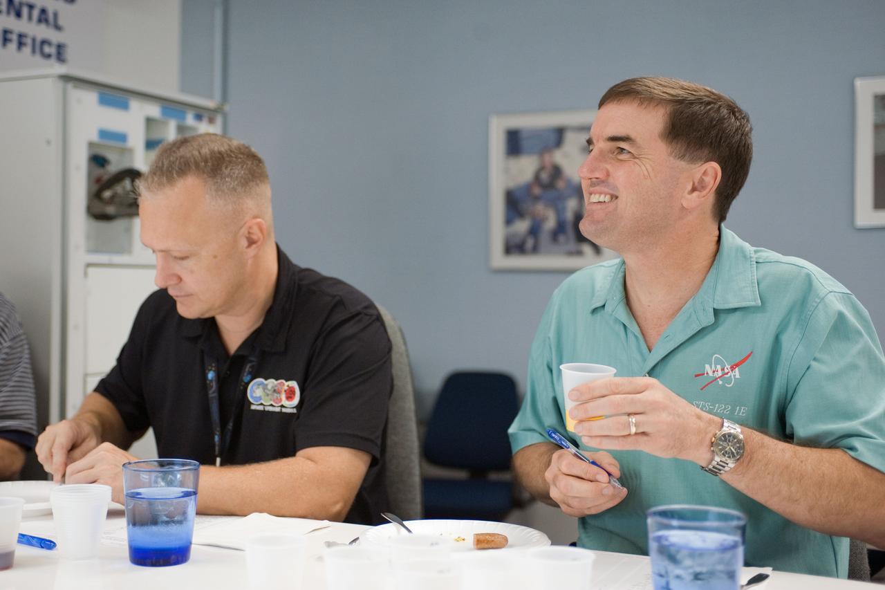 JSC2010-E-185481 (10 Nov. 2010) --- NASA astronauts Doug Hurley (left), STS-135 pilot; and Rex Walheim, mission specialist, participate in a food tasting session in the Habitability and Environmental Factors Office at NASA's Johnson Space Center. STS-135 is planned to be the final mission of the space shuttle program. Photo credit: NASA or National Aeronautics and Space Administration
