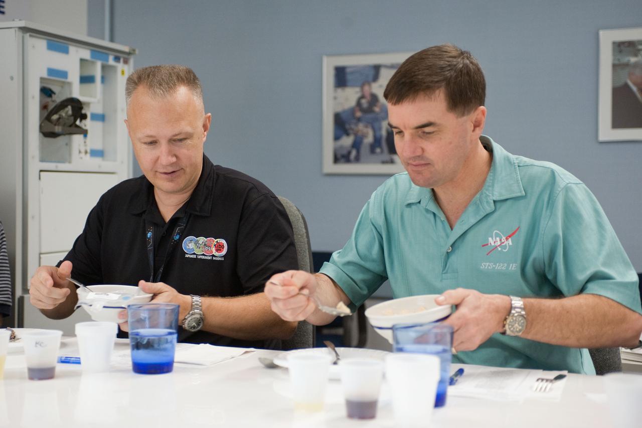 JSC2010-E-185484 (10 Nov. 2010) --- NASA astronauts Doug Hurley (left), STS-135 pilot; and Rex Walheim, mission specialist, participate in a food tasting session in the Habitability and Environmental Factors Office at NASA's Johnson Space Center. STS-135 is planned to be the final mission of the space shuttle program. Photo credit: NASA or National Aeronautics and Space Administration