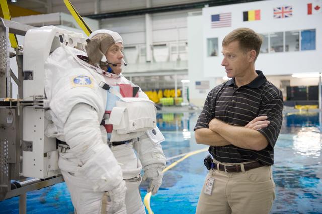 NASA image: Expedition 27 crew member Ron Garan with STS-335 crew member Rex Walheim  