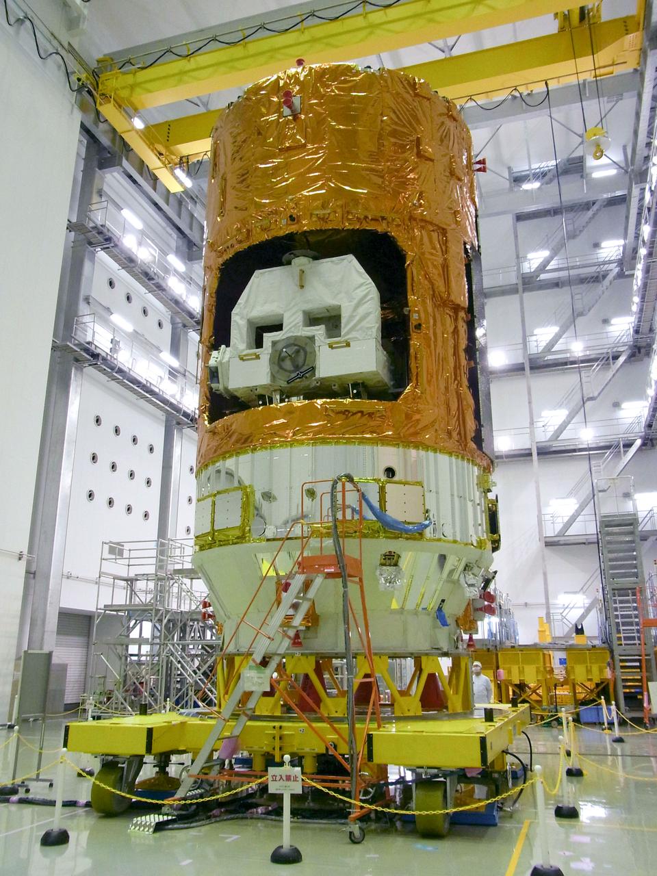 JSC2010-E-188664 (25 Nov. 2010) --- The H-II Transfer Vehicle 2 (Kounotori 2) is pictured during media day at the JAXA Tanegashima Space Center, Kagoshima Prefecture, Japan on  Nov. 25,  2010. Reporters were invited to the Space Center to see the fully assembled HTV2.  Photo credit: Japan Aerospace Exploration Agency