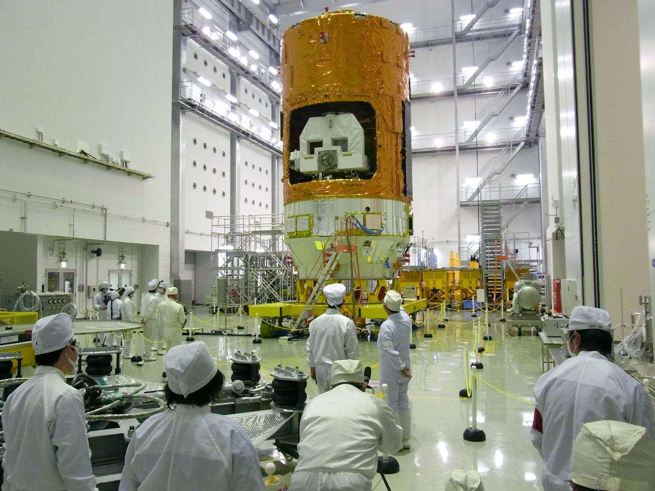 JSC2010-E-188666 (25 Nov. 2010) --- The H-II Transfer Vehicle 2 (Kounotori 2) is pictured during media day at the JAXA Tanegashima Space Center, Kagoshima Prefecture, Japan on  Nov. 25,  2010. Reporters were invited to the Space Center to see the fully assembled HTV2.  Photo credit: Japan Aerospace Exploration Agency