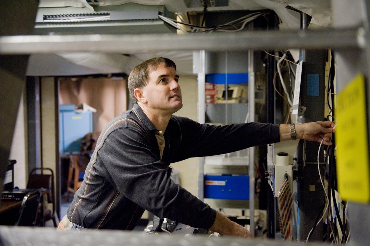 JSC2010-E-193959 (2 Dec. 2010) --- NASA astronaut Rex Walheim, STS-135 mission specialist, participates in a training session in the fixed-base shuttle mission simulator (SMS) in the Jake Garn Simulation and Training Facility at NASA's Johnson Space Center. STS-135 is planned to be the final mission of the space shuttle program. Photo credit: NASA or National Aeronautics and Space Administration