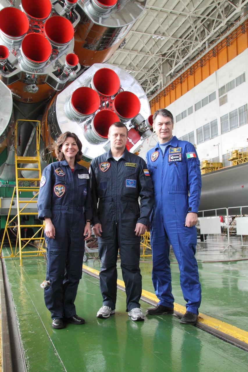 Coleman, Kondratyev and Nespoli depart Integration stand with Soyuz TMA-20 at completion of final fit check. -NASA/Victor Zelentsov