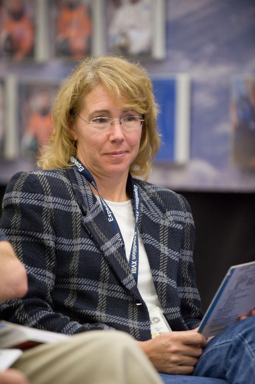JSC2010-E-195518 (3 Dec. 2010) --- NASA astronaut Sandy Magnus, STS-135 mission specialist, is pictured during an emergency egress training session in the Space Vehicle Mock-up Facility at NASA's Johnson Space Center. STS-135 is planned to be the final mission of the space shuttle program. Photo credit: NASA or National Aeronautics and Space Administration